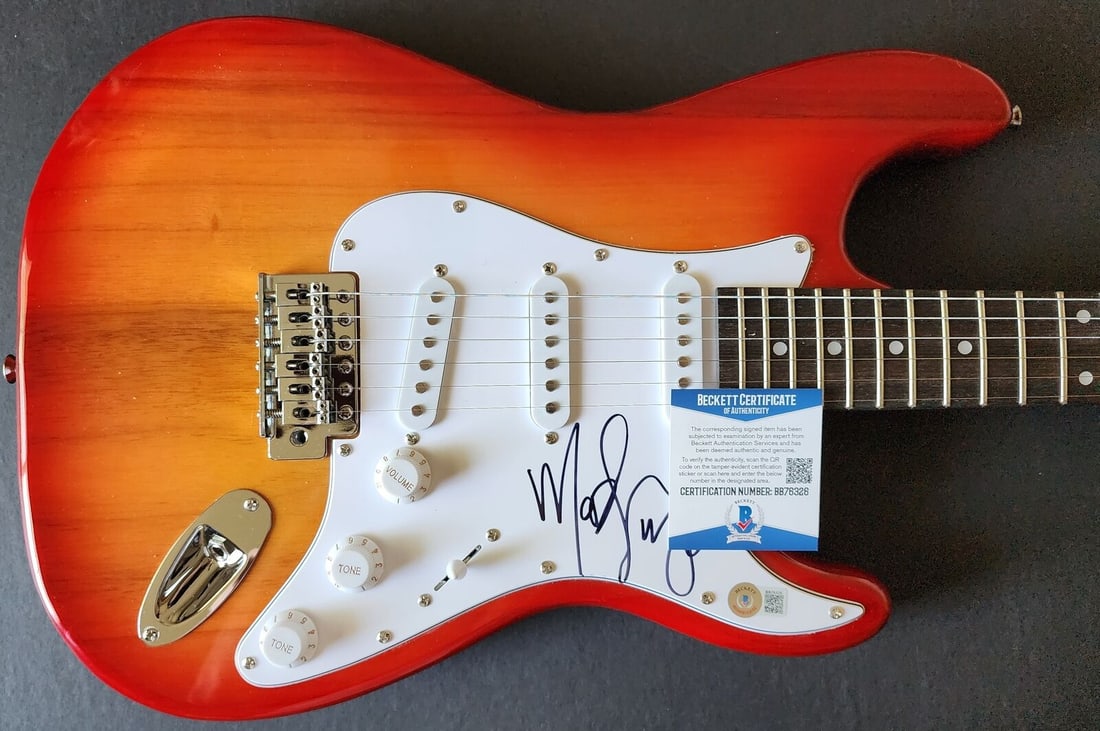 Mod Sun Autographed Electric Guitar with Beckett Certification: Mod Sun Autographed Electric Guitar with Beckett Certification This original electric guitar is hand-signed by musician Mod Sun. It comes with Beckett Autograph Authentication for verified provenance.