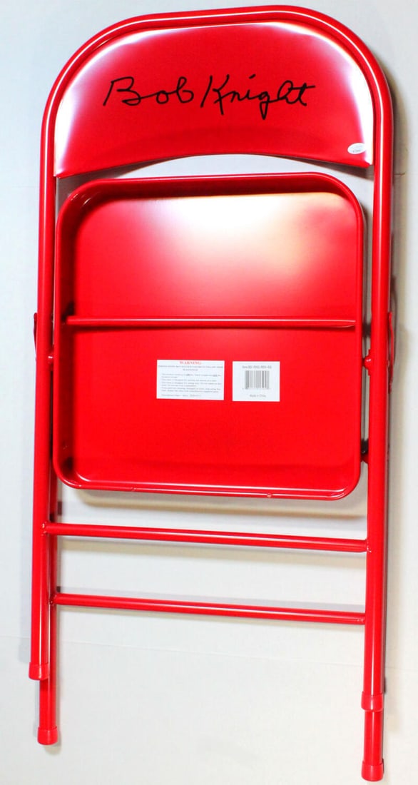 Bob Knight Autographed Red Basketball Chair: Bob Knight Autographed Red Basketball Chair This unique red chair features an autographed seat cushion by basketball legends Bob Knight and Phil Bova. Perfect for collectors and sports enthusiasts, it