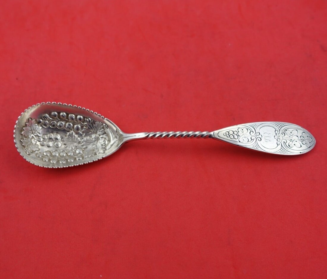George Sharp Sterling Silver Preserve Spoon 6.75in Twisted Berry Leaves: George Sharp Sterling Silver Preserve Spoon 6.75in Twisted Berry Leaves This exquisite George Sharp serving spoon features a twisted handle adorned with berry and leaf motifs in the bowl. Crafted from