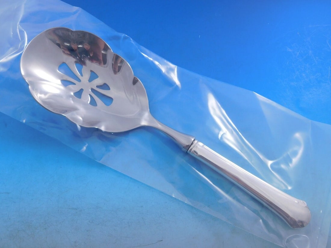 Towle Chippendale Sterling Silver Pierced Vegetable Spoon 9.375in: Towle Chippendale Sterling Silver Pierced Vegetable Spoon 9.375in This custom-made Towle Chippendale sterling silver pierced vegetable spoon features a scalloped bowl and a hollow handle with a stainl