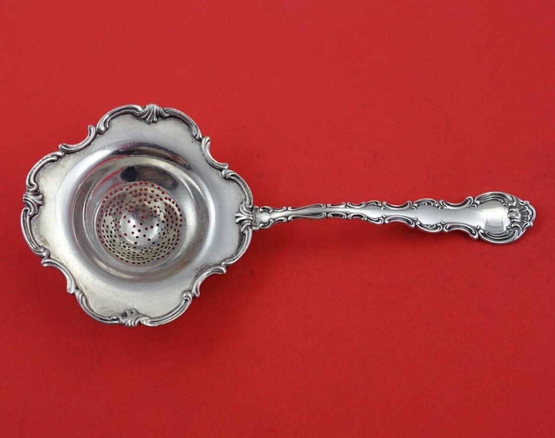 Gorham Strasbourg Sterling Silver Tea Strainer 6.75in: Gorham Strasbourg Sterling Silver Tea Strainer 6.75in This exquisite Gorham Strasbourg tea strainer is crafted from sterling silver (.925) and features a beautiful design in the bowl. Measuring 6.75 i
