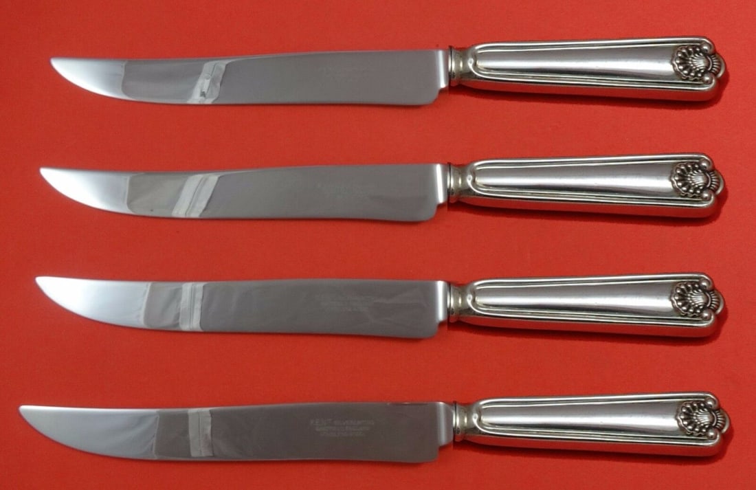 Frank Smith Fiddle Shell Sterling Silver Steak Knife Set 4-Piece Texas Sized: Frank Smith Fiddle Shell Sterling Silver Steak Knife Set 4-Piece Texas Sized This custom 4-piece steak knife set features a Fiddle Shell pattern by Frank Smith. Made of sterling silver with hollow han