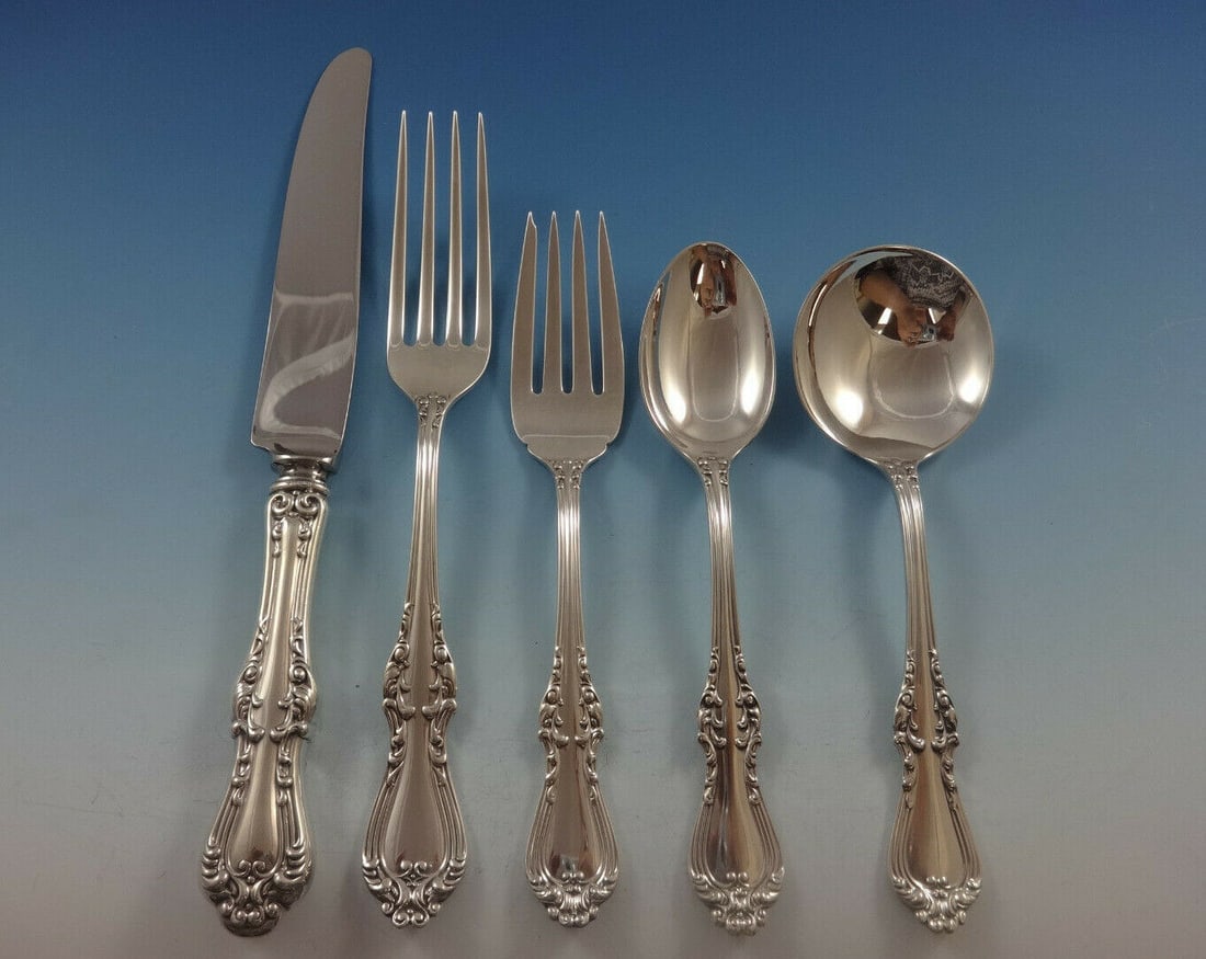 Countess Sterling Silver Flatware Set by Frank Smith for 12 - 66 Pieces with Storage Chest: Countess Sterling Silver Flatware Set by Frank Smith for 12 - 66 Pieces with Storage Chest This exquisite Countess flatware set by Frank Smith includes 66 pieces, perfect for entertaining. The set is
