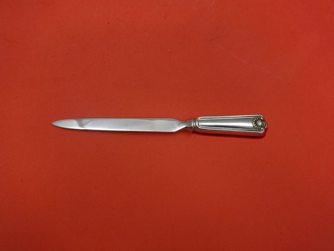 Frank Smith Sterling Silver Fiddle Shell Letter Opener 8in: Frank Smith Sterling Silver Fiddle Shell Letter Opener 8in This exquisite letter opener features a fiddle shell design by renowned maker Frank Smith. Crafted from sterling silver, it has a hollow hand