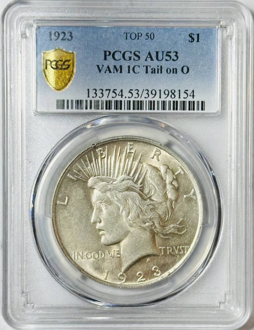 1923 P Peace Dollar PCGS AU-53 Silver Coin: 1923 P Peace Dollar PCGS AU-53 Silver Coin This 1923 P Peace Dollar is certified by PCGS with a grade of AU 53. It features a silver composition and was minted in Philadelphia. Ideal for collectors, t