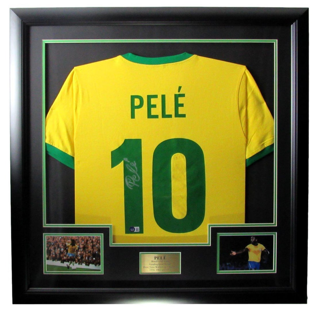 Pele Signed Autographed Brazil Soccer Jersey Framed Beckett 163596: Pele Signed Autographed Brazil Soccer Jersey Framed Beckett 163596 This authentic Brazil soccer jersey features the legendary Pele's autograph and comes beautifully framed. It is an original piece, pe