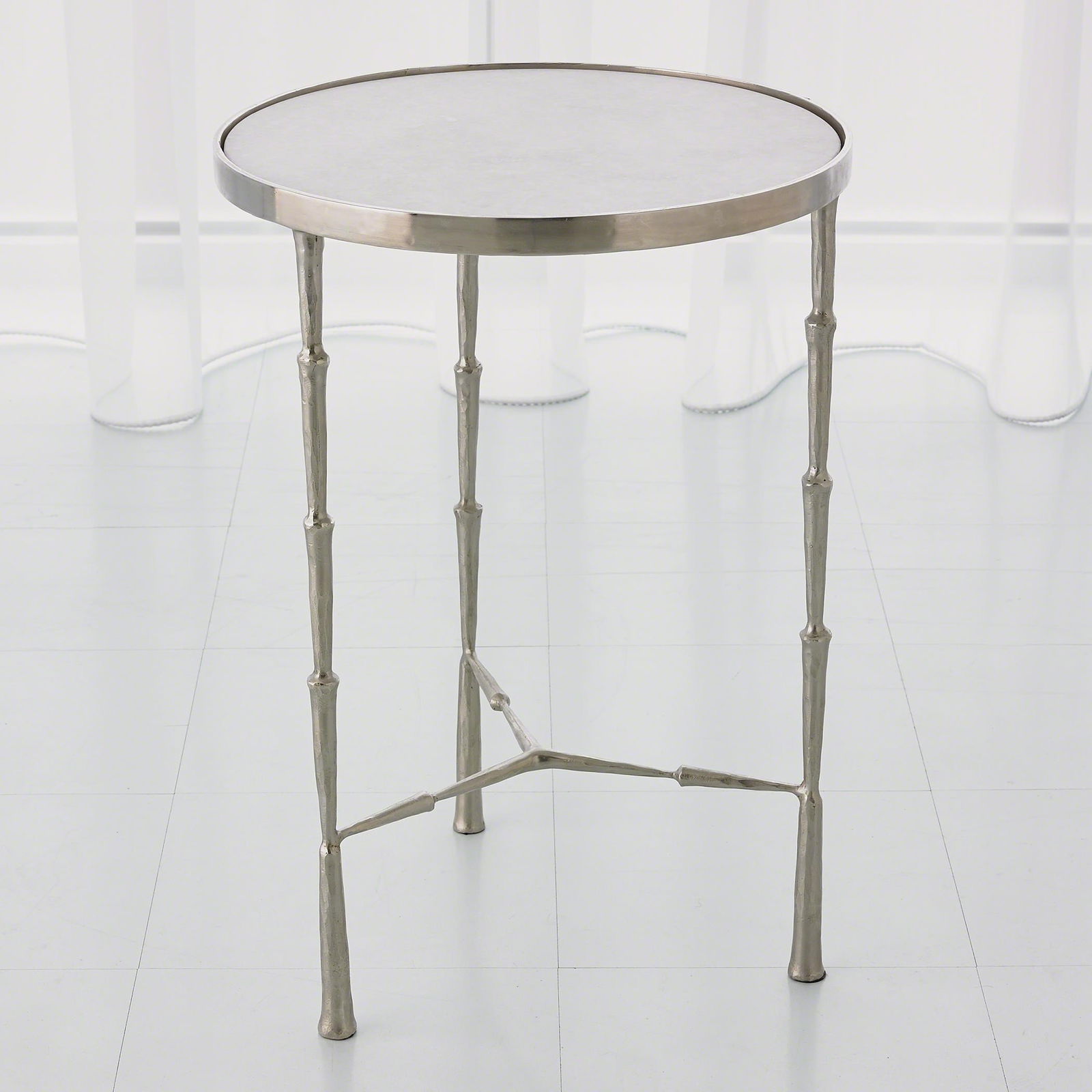 Spike Accent Table In Antique Nickel With White Marble: Spike Accent Table In Antique Nickel With White Marble Individual iron spikes are forged together to create the Spike Accent Table. White marble top. Available in antique nickel or antique brass finis