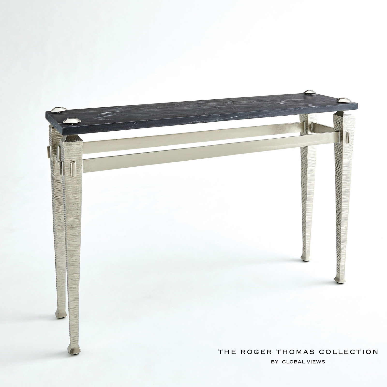 Roman Console In Nickel: Roman Console In Nickel The Roman collection by Roger Thomas draws inspiration from two notable sources. The silhouette of the leg was inspired by pieces crafted by Thomas Chippendale. The horizontal
