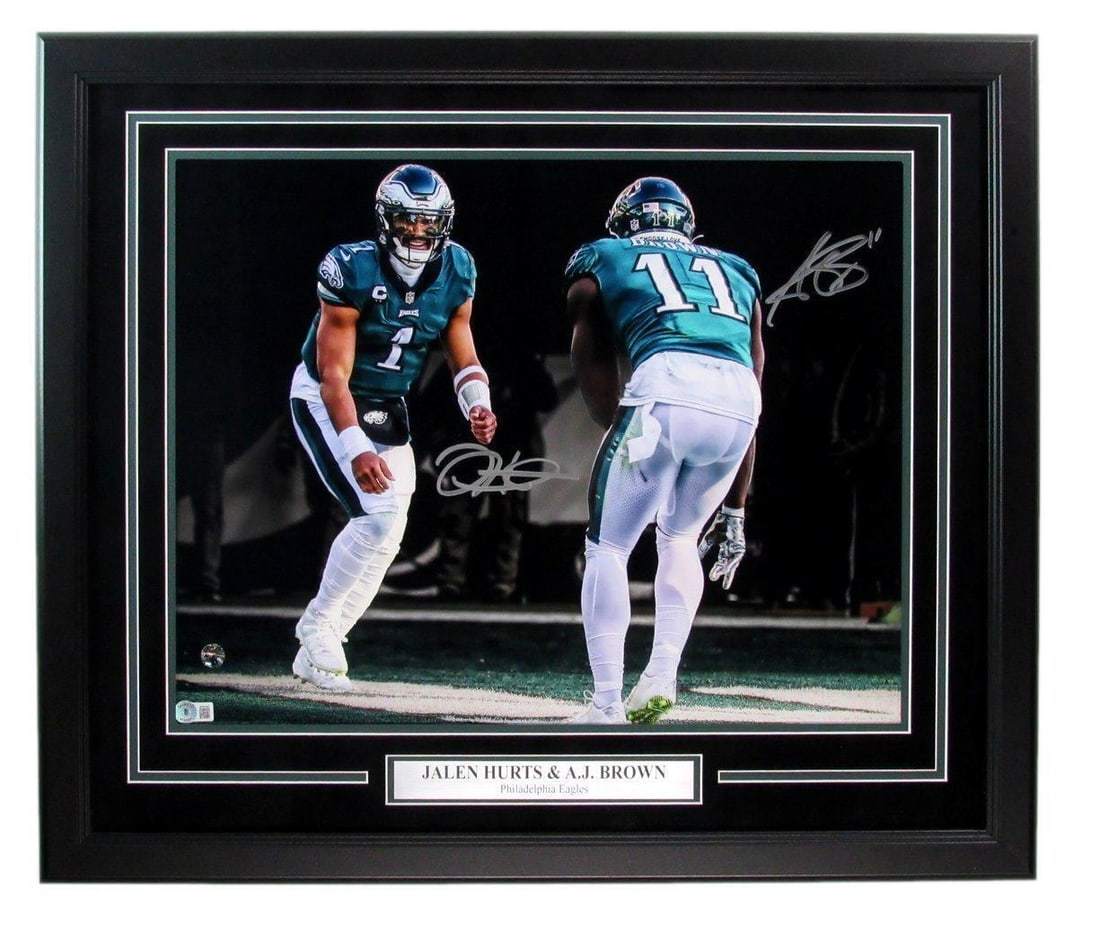 Jalen Hurts A.J. Brown Dual-Signed 16in x 20in Framed Photo Eagles Beckett 184698: Jalen Hurts A.J. Brown Dual-Signed 16in x 20in Framed Photo Eagles Beckett 184698 This original 16in x 20in photo features dual signatures from Jalen Hurts and A.J. Brown, showcasing their remarkable 