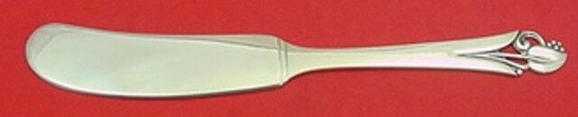Frank Smith Woodlily Sterling Silver Butter Spreader 6.25in: Frank Smith Woodlily Sterling Silver Butter Spreader 6.25in This exquisite butter spreader features a flat handle design in the Woodlily pattern by Frank Smith. Made from sterling silver, this piece m