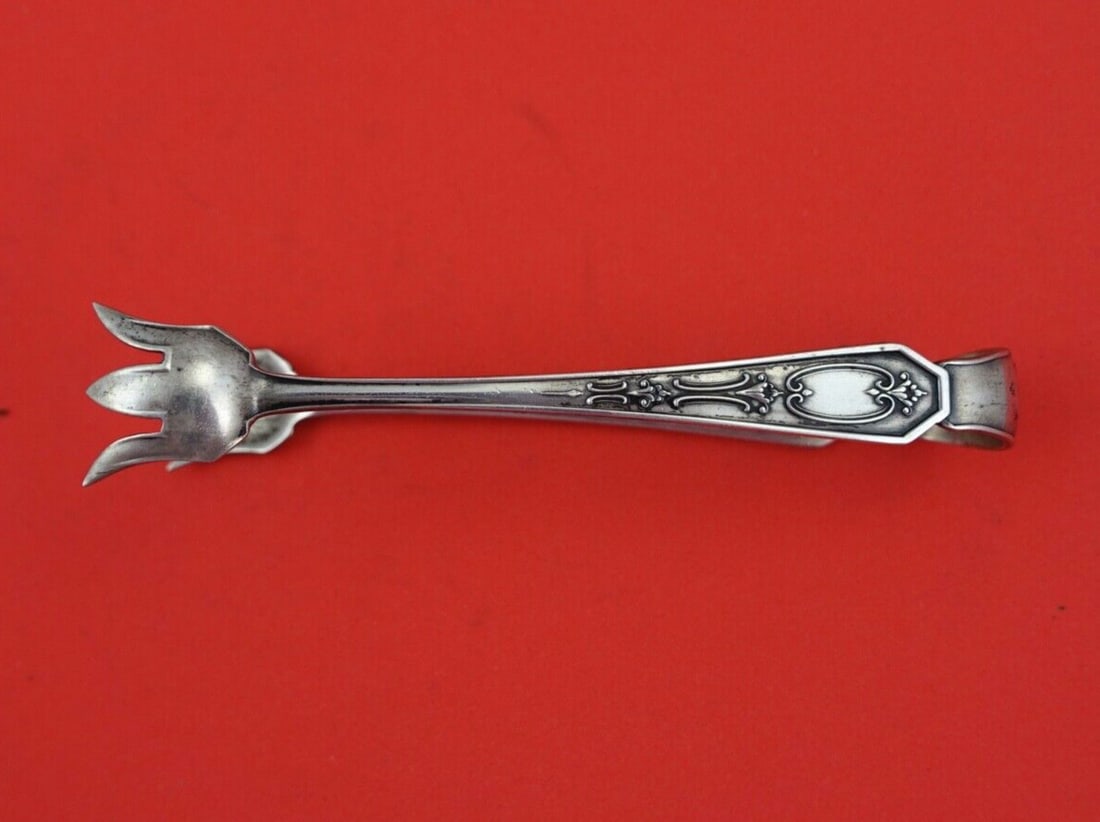 Vergennes Sterling Silver Sugar Tong 4in by Frank Smith: Vergennes Sterling Silver Sugar Tong 4in by Frank Smith This Vergennes pattern sterling silver sugar tong by Frank Smith measures 4 inches and features a classic design. It is un-monogrammed and craft