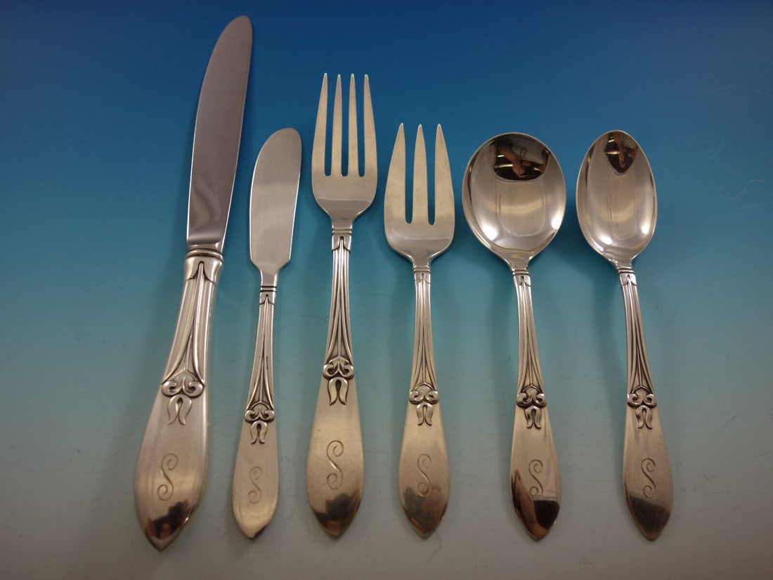 Frank Smith Tulipan Sterling Silver Flatware Set for 12, 72 pcs, S Monogram: Frank Smith Tulipan Sterling Silver Flatware Set for 12, 72 pcs, S Monogram This stunning Tulipan flatware set by Frank Smith, produced between 1900-1940, includes 72 pieces designed for service for 1