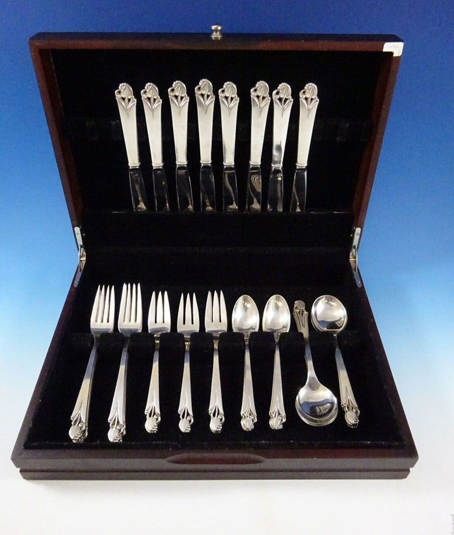 Frank Smith Woodlily Sterling Silver Flatware Set for 8 - 40 Pieces with Storage Chest: Frank Smith Woodlily Sterling Silver Flatware Set for 8 - 40 Pieces with Storage Chest This exquisite Woodlily flatware set by Frank Smith is crafted from sterling silver and features a graceful Danis
