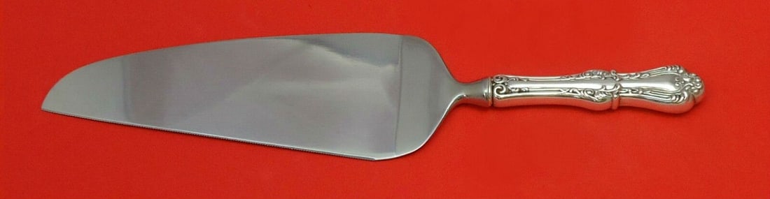 Countess by Frank Smith Sterling Silver Pie Server 10.5 inch: Countess by Frank Smith Sterling Silver Pie Server 10.5 inch This Countess pie server by Frank Smith features a sterling silver hollow handle complemented by a stainless steel blade. Crafted post-1940