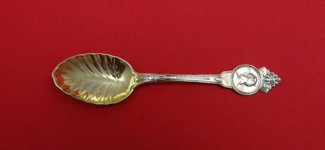 Medallion Sterling Silver Ice Cream Spoon by John Cook Gold Washed Fluted 4.875in: Medallion Sterling Silver Ice Cream Spoon by John Cook Gold Washed Fluted 4.875in This Medallion pattern ice cream spoon, crafted by John Cook, features gold washed fluted detailing and is made of ste