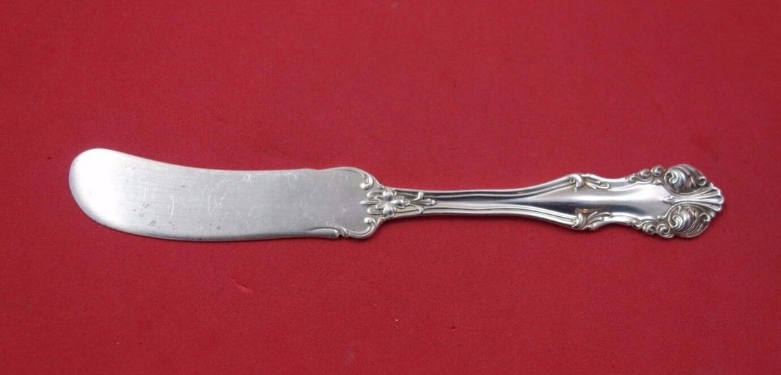 Frank Smith George VI Sterling Silver Butter Spreader 5.5in: Frank Smith George VI Sterling Silver Butter Spreader 5.5in This Frank Smith George VI butter spreader features a flat handle design and is made of sterling silver. The item measures 5.5 inches in len