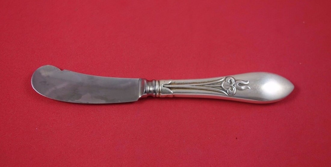 Frank Smith Tulipan Sterling Silver Butter Spreader 6 Inch Hollow Handle: Frank Smith Tulipan Sterling Silver Butter Spreader 6 Inch Hollow Handle This exquisite butter spreader features the Tulipan pattern by Frank Smith, crafted from sterling silver with a hollow handle a