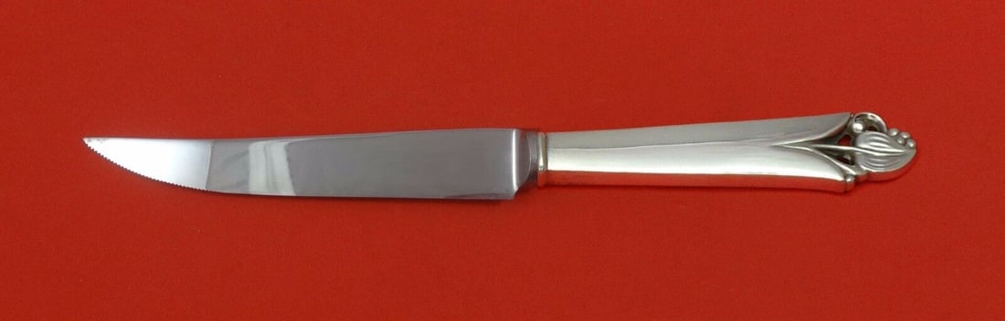 Frank Smith Woodlily Sterling Silver Steak Knife 8.5in Serrated Blade: Frank Smith Woodlily Sterling Silver Steak Knife 8.5in Serrated Blade This custom made steak knife features a hollow handle crafted from sterling silver and a serrated stainless steel blade. The knife