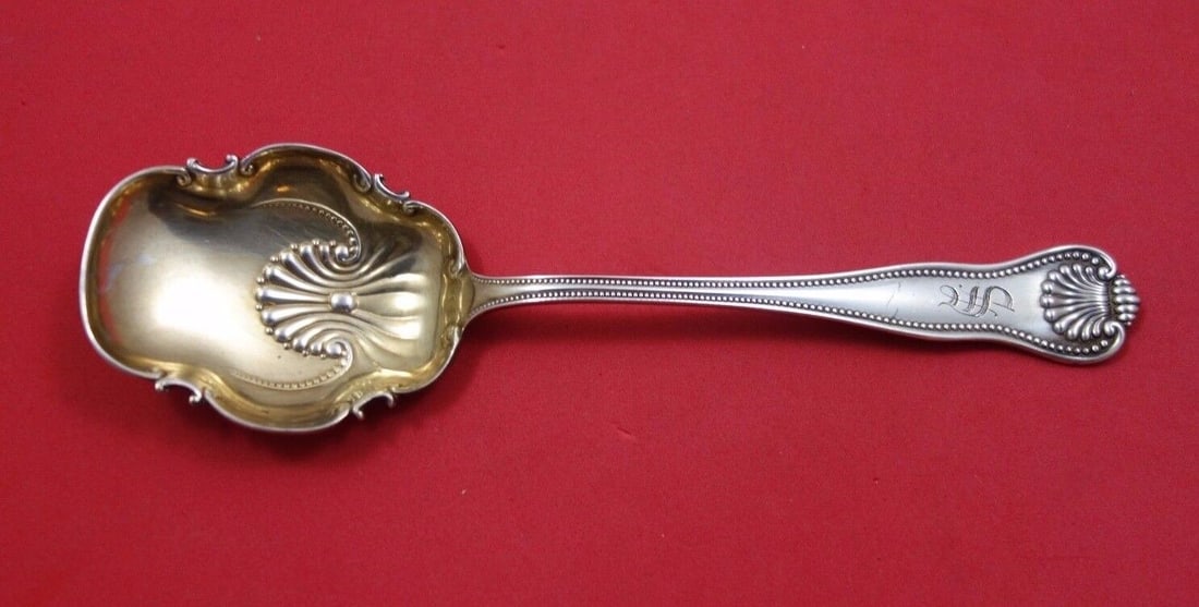 Newport Shell Sterling Silver Preserve Spoon by Frank Smith Gold Washed 7.25in: Newport Shell Sterling Silver Preserve Spoon by Frank Smith Gold Washed 7.25in This exquisite Newport Shell preserve spoon, crafted by Frank Smith, features a stunning gold washed finish. Made from st
