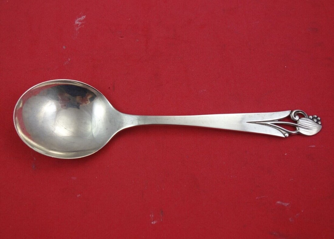 Woodlily Sterling Silver Cream Soup Spoon by Frank Smith 6.5 inches: Woodlily Sterling Silver Cream Soup Spoon by Frank Smith 6.5 inches This Woodlily cream soup spoon by Frank Smith features a beautiful sterling silver composition. It measures 6.5 inches and is in exc