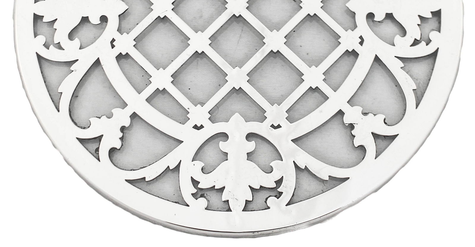 Set of Three Sterling Silver Trivets: Set of Three Sterling Silver Trivets This elegant set of three trivets features fine Sterling Silver with glass accents, crafted by Webster & Company. Each trivet has a diameter of 7 inches and a heig