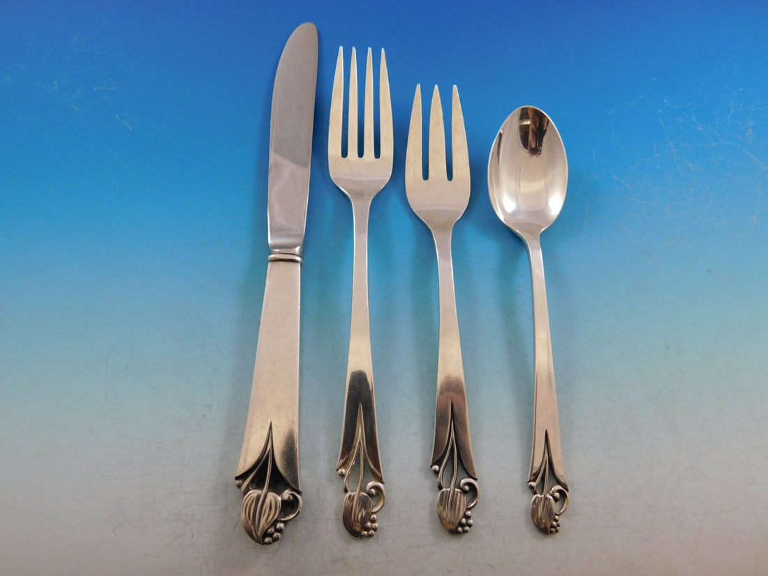 Frank Smith Woodlily Sterling Silver Flatware Set for 8, 32 Pieces with Storage Chest: Frank Smith Woodlily Sterling Silver Flatware Set for 8, 32 Pieces with Storage Chest This Frank Smith Woodlily flatware set is crafted from sterling silver and features a graceful Danish-moderne styl