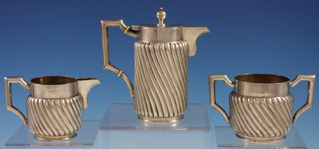 Austrian .800 Silver 3pc Tea Set Demitasse Set Swirled Twist Design: Austrian .800 Silver 3pc Tea Set Demitasse Set Swirled Twist Design Austrian .800 silver 3-piece tea set featuring a captivating swirled twist design. This versatile set can be used for espresso/demit
