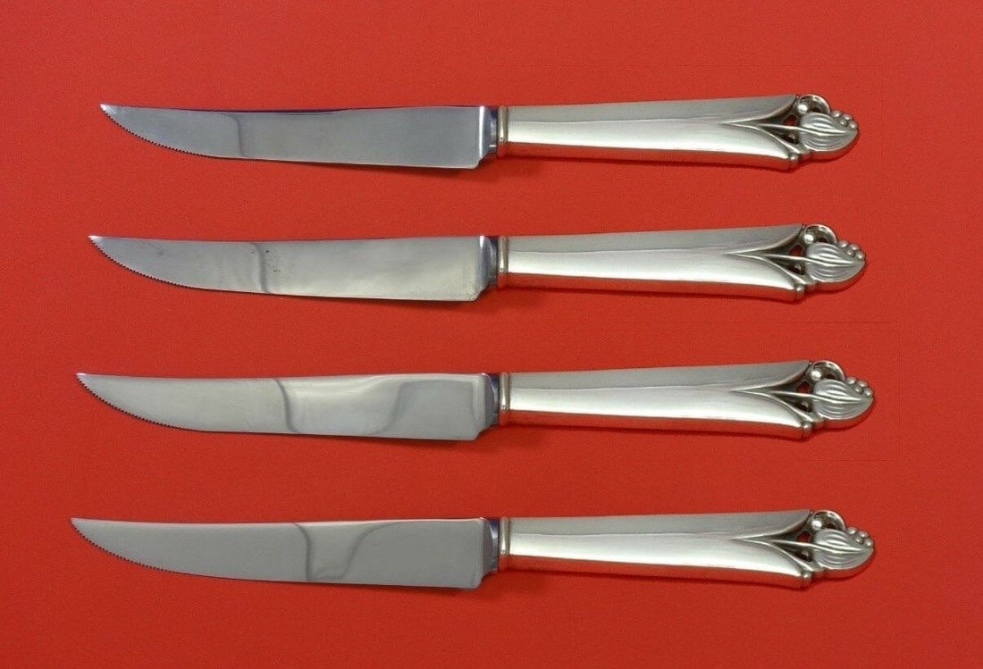 Woodlily Sterling Silver Steak Knife Set 4 Piece by Frank Smith 8.5 Inches: Woodlily Sterling Silver Steak Knife Set 4 Piece by Frank Smith 8.5 Inches This exquisite Woodlily by Frank Smith Sterling Silver Steak Knife Set includes 4 custom-made knives, each featuring a hollow