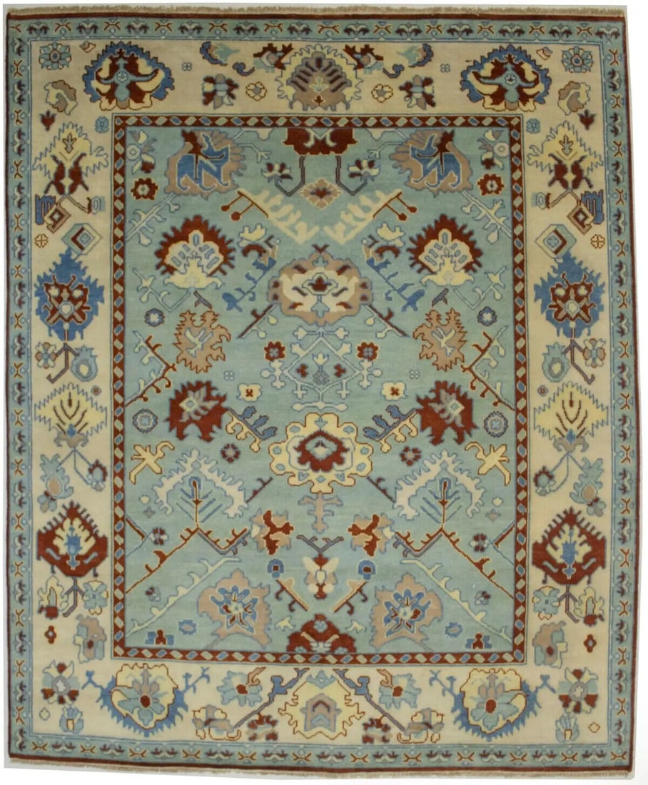 Light Blue Floral Handmade Oushak Chobi Area Rug 8.1ft x 9.9ft Wool: Light Blue Floral Handmade Oushak Chobi Area Rug 8.1ft x 9.9ft Wool This large handmade Oushak Chobi area rug features a beautiful floral pattern in muted colors including light blue, cream, rust, and