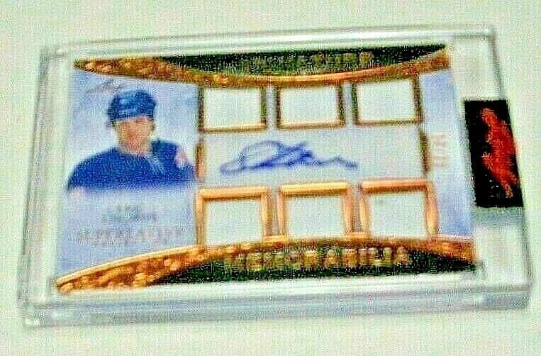 ERIC LINDROS 2021 LEAF SUPERLATIVE GAME USED JERSEY AUTO 12 OF 20 SIGNED CARD: ERIC LINDROS 2021 LEAF SUPERLATIVE GAME USED JERSEY AUTO 12 OF 20 SIGNED CARD This is a signed card featuring Eric Lindros with a game-used jersey piece, numbered 12 of 20. The card is ungraded and is