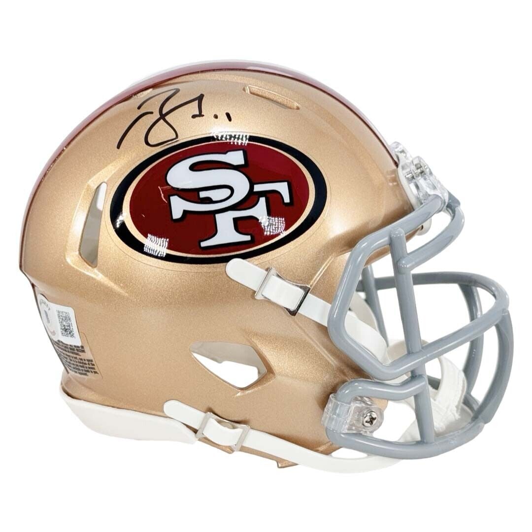 Brandon Aiyuk Signed San Francisco 49ers Mini Football Helmet: Brandon Aiyuk Signed San Francisco 49ers Mini Football Helmet A mini Riddell Speed NFL football helmet autographed by Brandon Aiyuk. This original item is authenticated by Beckett and includes a Witne