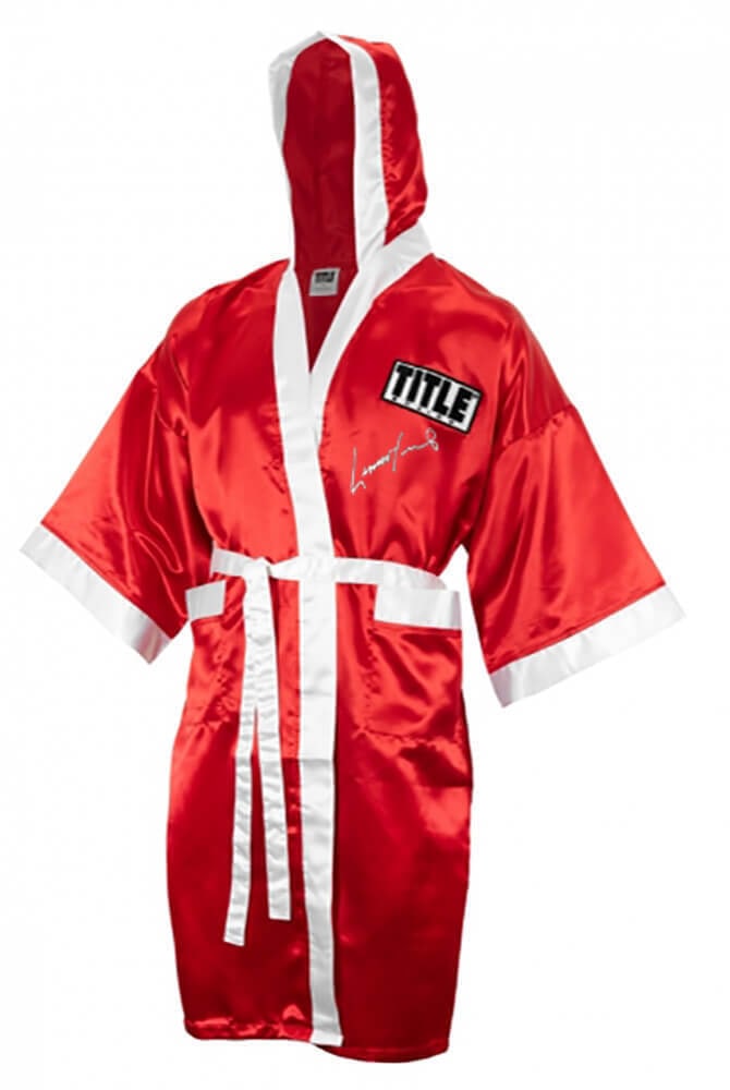 Lennox Lewis Signed Red Boxing Robe with Hood: Lennox Lewis Signed Red Boxing Robe with Hood This is a red boxing robe with hood, signed by Lennox Lewis, a multi heavyweight champion and Hall of Famer. The item is original and features a pristine 