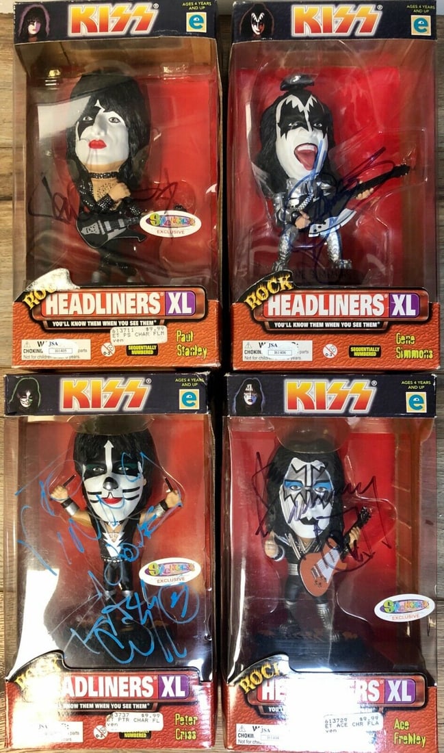 KISS Signed XL Figures by Simmons, Criss, Stanley, Frehley - JSA Authenticated: KISS Signed XL Figures by Simmons, Criss, Stanley, Frehley - JSA Authenticated This listing features a set of four XL figures of KISS, signed by band members Simmons, Criss, Stanley, and Frehley. The 