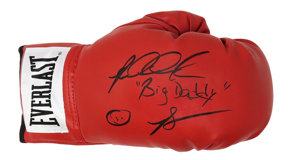 Riddick Bowe Signed Everlast Red Boxing Glove with Schwartz COA: Riddick Bowe Signed Everlast Red Boxing Glove with Schwartz COA This is an original boxing glove signed by Riddick Bowe, a multi heavyweight champion and Hall of Famer. The glove is authenticated by S