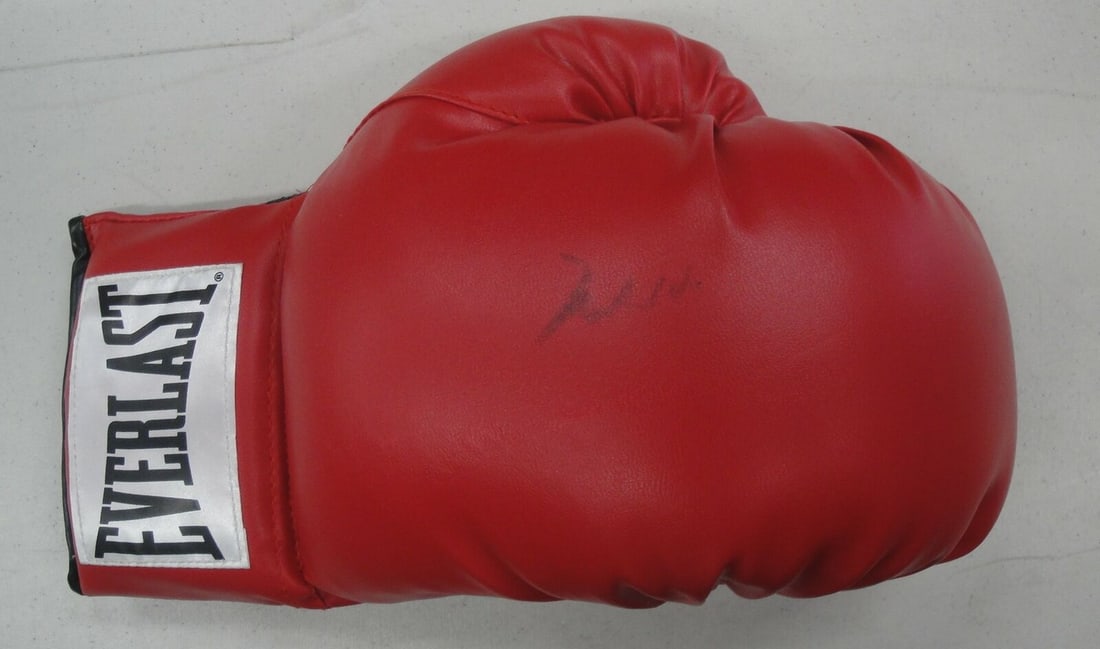 Muhammad Ali Hand Signed Autographed Red Everlast Boxing Glove GA 864572: Muhammad Ali Hand Signed Autographed Red Everlast Boxing Glove GA 864572 Sport: Boxing Product: Glove Original/Reprint: Original Player: Muhammad Ali Autograph Authentication: Global Authentics (GAI)