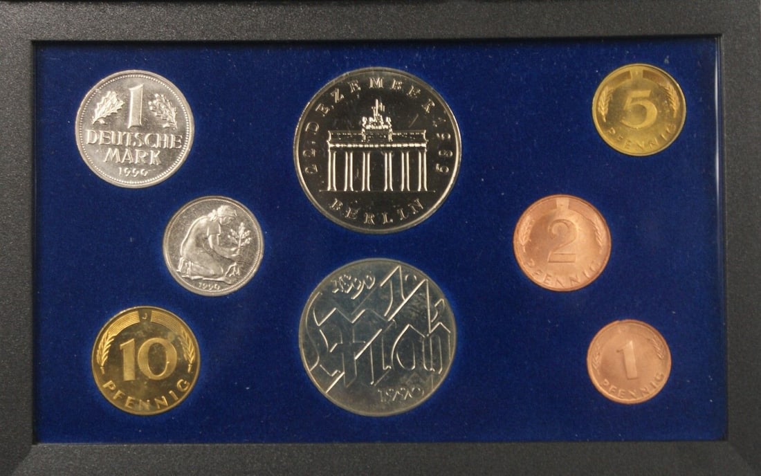 1990 German Uncirculated Silver Coin Set in Blue Presentation Box: 1990 German Uncirculated Silver Coin Set in Blue Presentation Box This 1990 German Eight Coin Silver Uncirculated Set features various denominations including 20 Marks Brandenburg Gate, 10 Marks May D