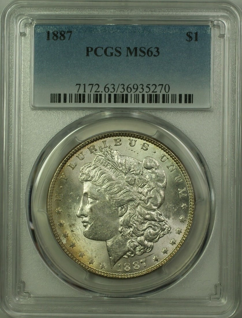 1887 Morgan Silver Dollar Coin PCGS MS63 Uncirculated: 1887 Morgan Silver Dollar Coin PCGS MS63 Uncirculated This 1887 Morgan Silver Dollar coin features a denomination of $1 and is certified by PCGS with a grade of MS 63. Minted in Philadelphia, this unc