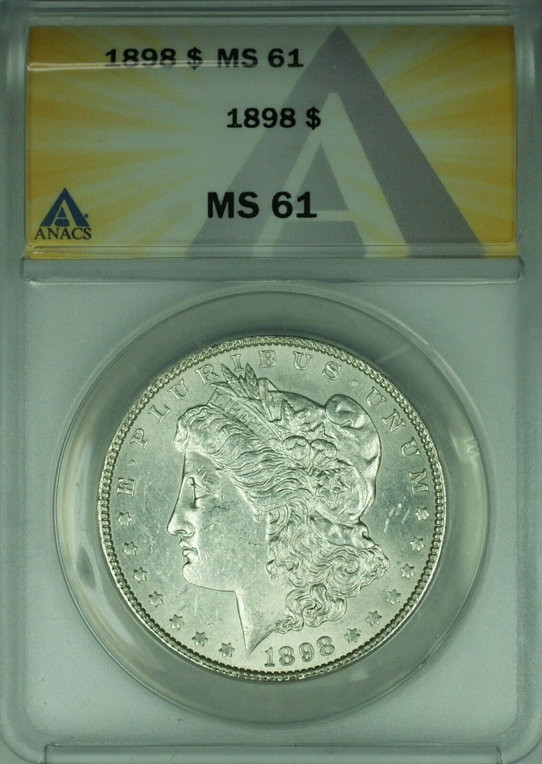 1898 Morgan Silver Dollar Coin ANACS MS61 Uncirculated Silver $1: 1898 Morgan Silver Dollar Coin ANACS MS61 Uncirculated Silver $1 This 1898 Morgan Silver Dollar is an uncirculated coin graded MS 61 by ANACS. It was minted in Philadelphia and features a silver compo