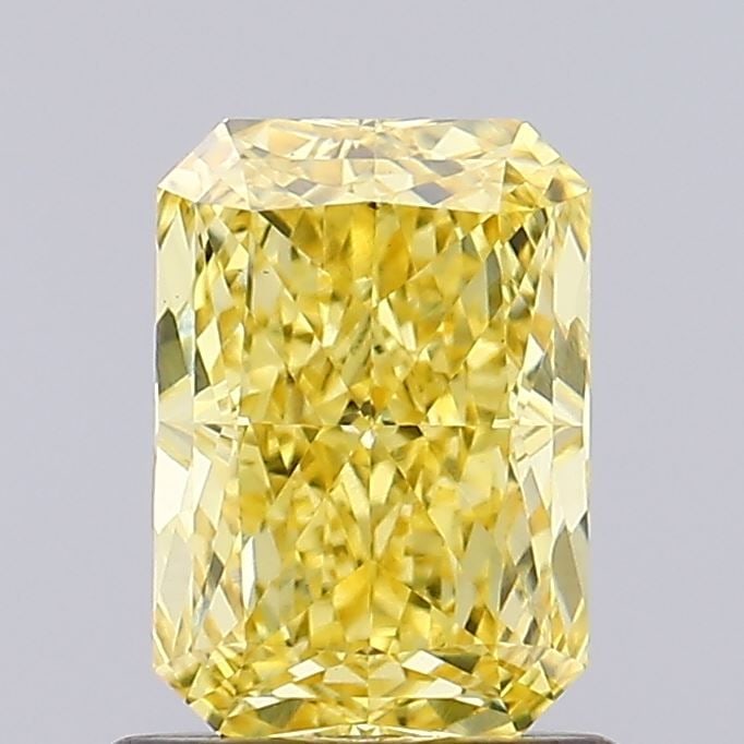 Loose Diamond - RADIANT 1.0ct Fancy Vivid Yellow VVS2: Loose Diamond - RADIANT 1.0ct Fancy Vivid Yellow VVS2 Source: This is a real non-mined Diamond that has been grown in a lab Shape: RADIANT Carats: 1.0 Color: Fancy Vivid Yellow Certification: IGI Vide