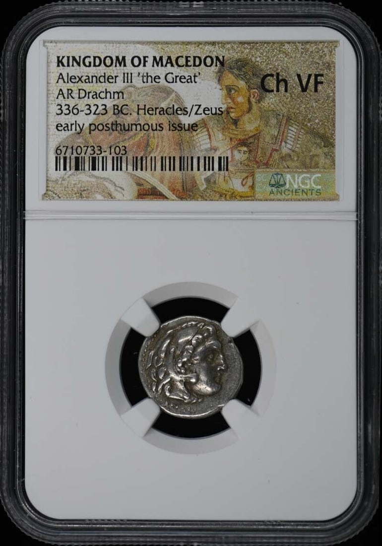Alexander III the Great Macedon Silver Drachm Coin NGC VF30: Alexander III the Great Macedon Silver Drachm Coin NGC VF30 This is a silver drachm coin from the Kingdom of Macedon, featuring a depiction of the head of Heracles or Zeus. The reverse side showcases 