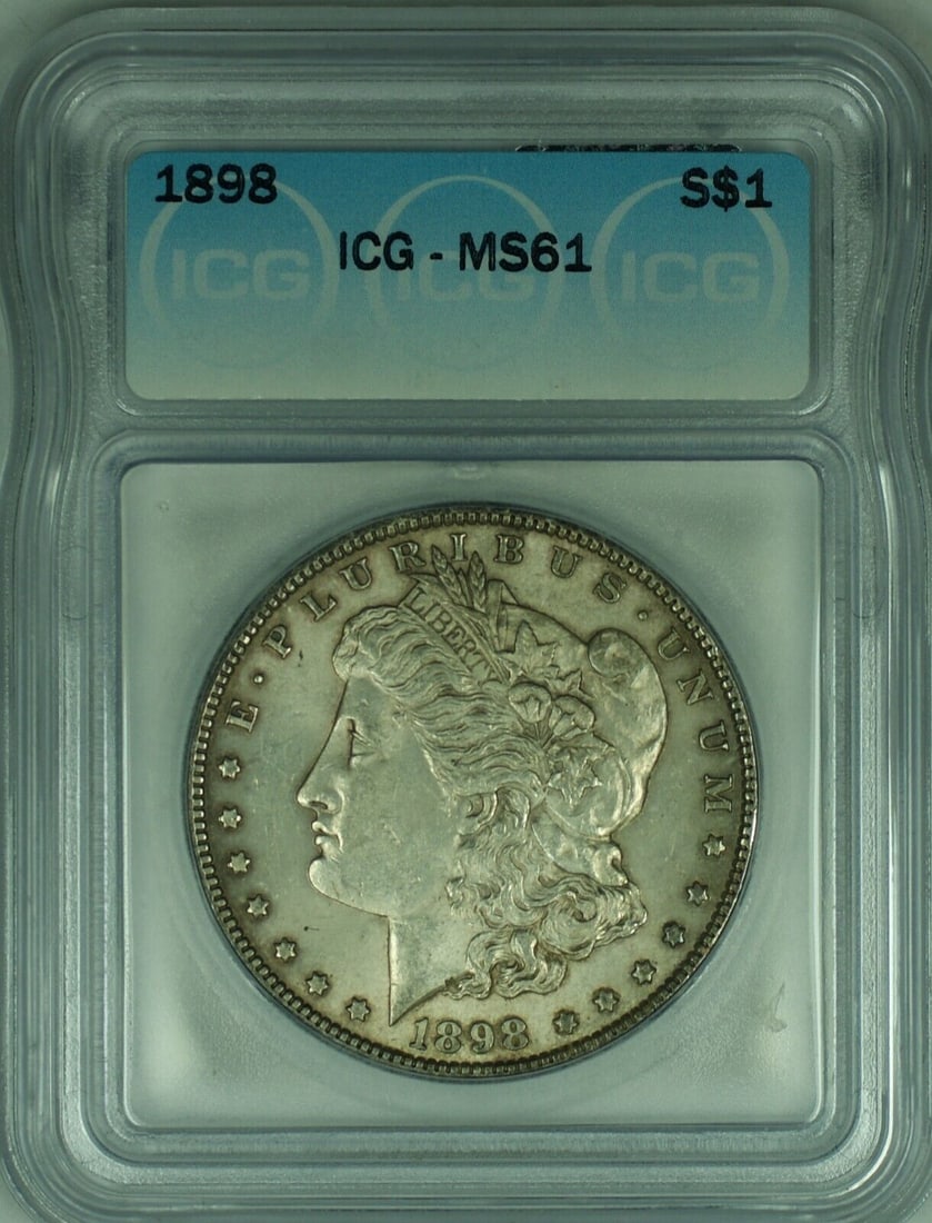 1898 Morgan Silver Dollar Coin ICG MS 61 Uncirculated Silver: 1898 Morgan Silver Dollar Coin ICG MS 61 Uncirculated Silver This 1898 Morgan Silver Dollar is an uncirculated coin with a grade of MS 61, certified by ICG. Made of silver, it showcases the classic Mo