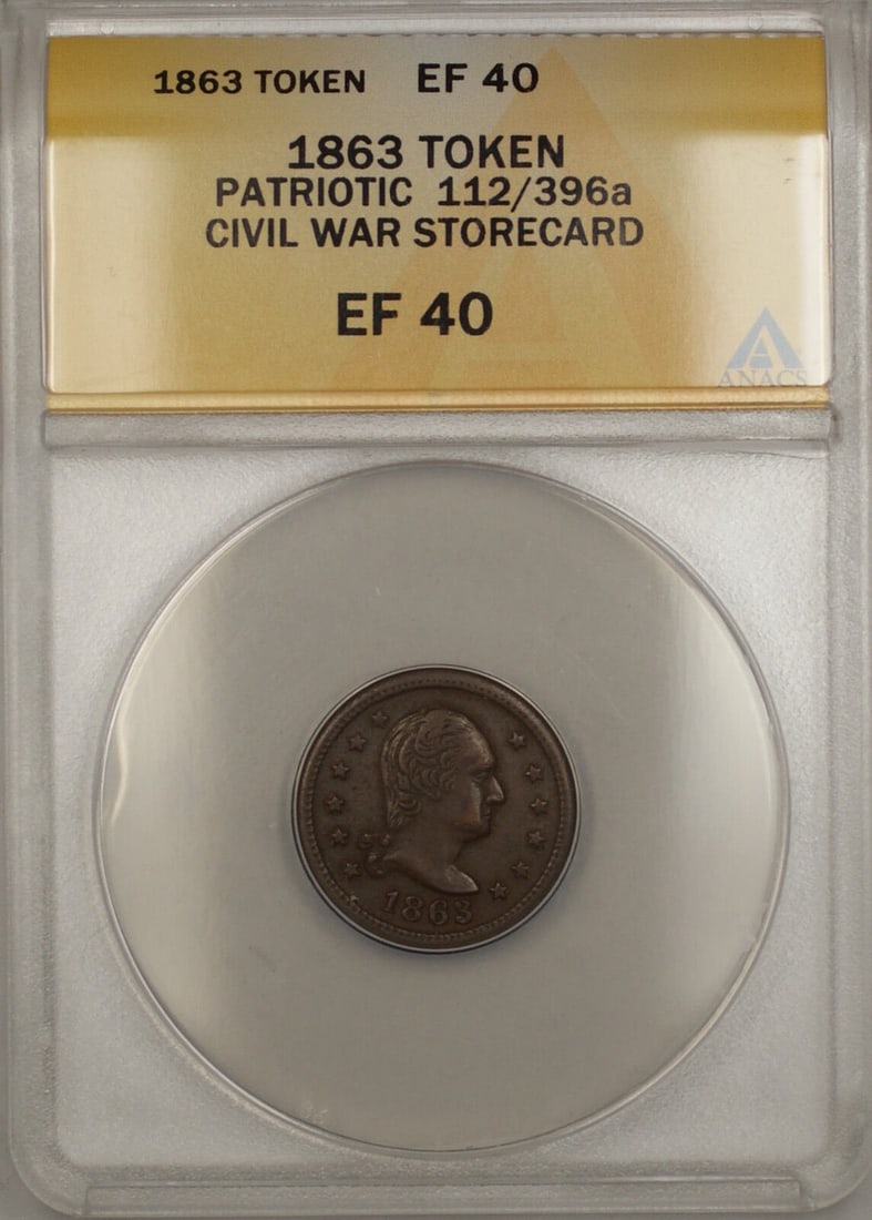 1863 Patriotic Civil War Wilson's Storecard Token ANACS EF40: 1863 Patriotic Civil War Wilson's Storecard Token ANACS EF40 This 1863 Patriotic Civil War Wilson's Storecard Token is graded EF 40 by ANACS, indicating it is in circulated condition. The token featur