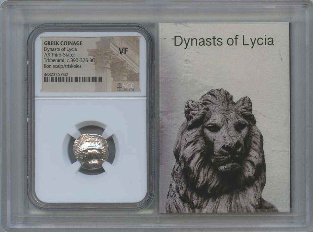 Ancient Greek Dynasts of Lycia Third Stater Coin c390-375 BC NGC VF 35: Ancient Greek Dynasts of Lycia Third Stater Coin c390-375 BC NGC VF 35 This ancient Greek coin, known as an AR Third-Stater, hails from the Dynasts of Lycia, dated between 390-375 BC. It features a li