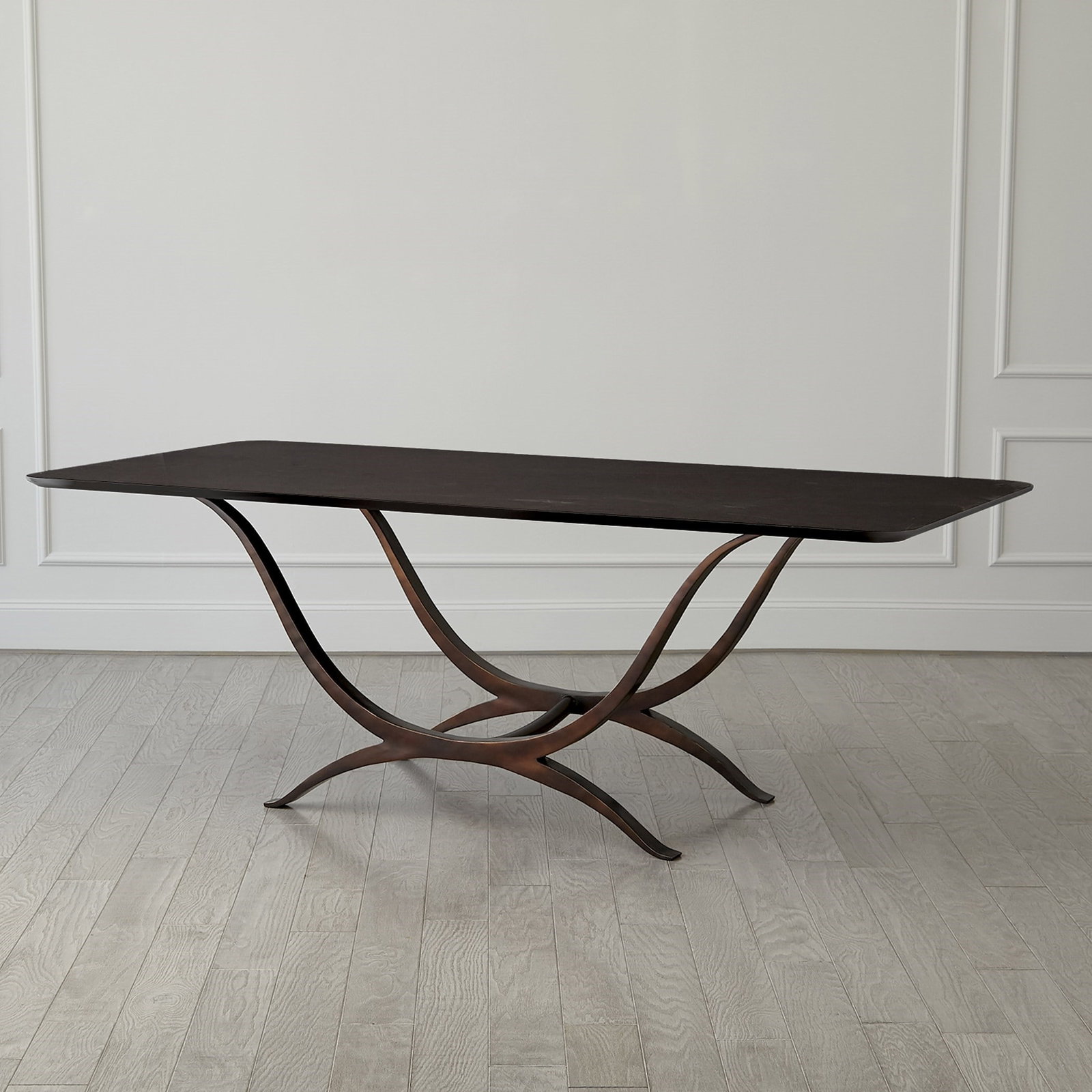 Chorda Rectangle Dining Table In Bronze: Chorda Rectangle Dining Table In Bronze The Chorda Dining Tables reflect the classic shape of the Grecian pulled longbow constructed of hand forged iron with a faux bronze finish supporting Italian ta