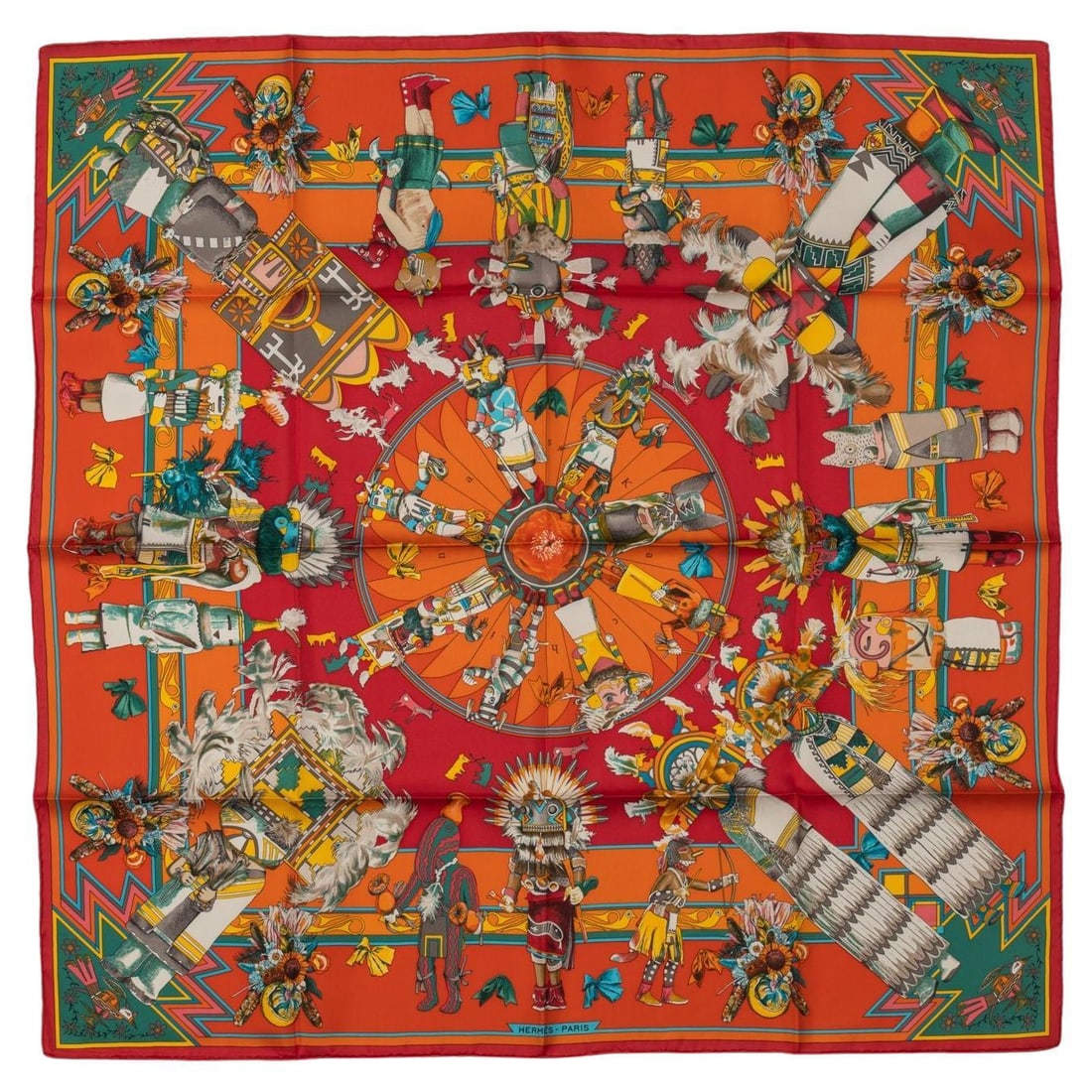 Hermes Kachinas Tribal Silk Scarf 35in x 35in France 21st Century: Hermes Kachinas Tribal Silk Scarf 35in x 35in France 21st Century This exquisite Hermes Kachinas Tribal Silk Scarf features a vibrant design showcasing multiple Native American figures arranged in a c