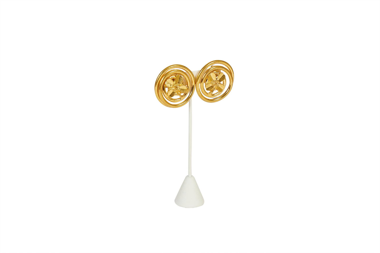 1990s Vintage Chanel Oversize Clover Logo Earrings from France: 1990s Vintage Chanel Oversize Clover Logo Earrings from France These stunning vintage Chanel earrings feature an oversize clover logo design, crafted in a golden finish. Manufactured in 1994, these ea