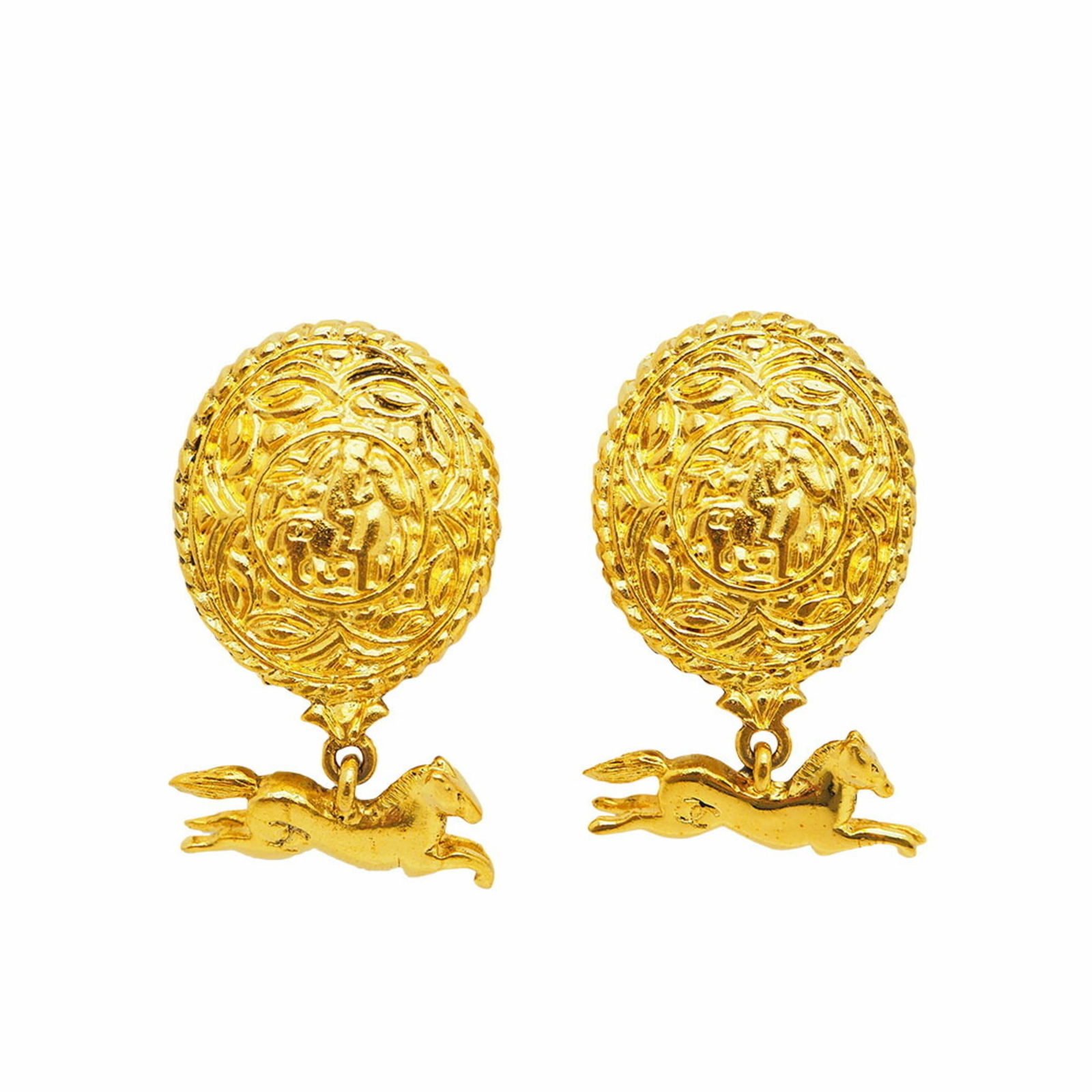Chanel Vintage Coco Gold Horse Swing Earrings: Chanel Vintage Coco Gold Horse Swing Earrings These vintage Chanel earrings feature a distinctive horse swing design in gold. Part of the Coco line, they exhibit moderate scratches and traces of use b