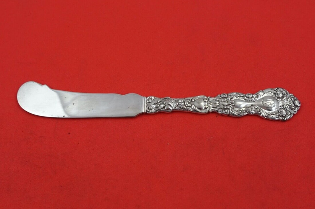 Gorham Imperial Chrysanthemum Sterling Silver Butter Spreader 6 3/8 inches: Gorham Imperial Chrysanthemum Sterling Silver Butter Spreader 6 3/8 inches This Imperial Chrysanthemum by Gorham Sterling Silver Butter Spreader features a flat handle and measures large at 6 3/8 inch