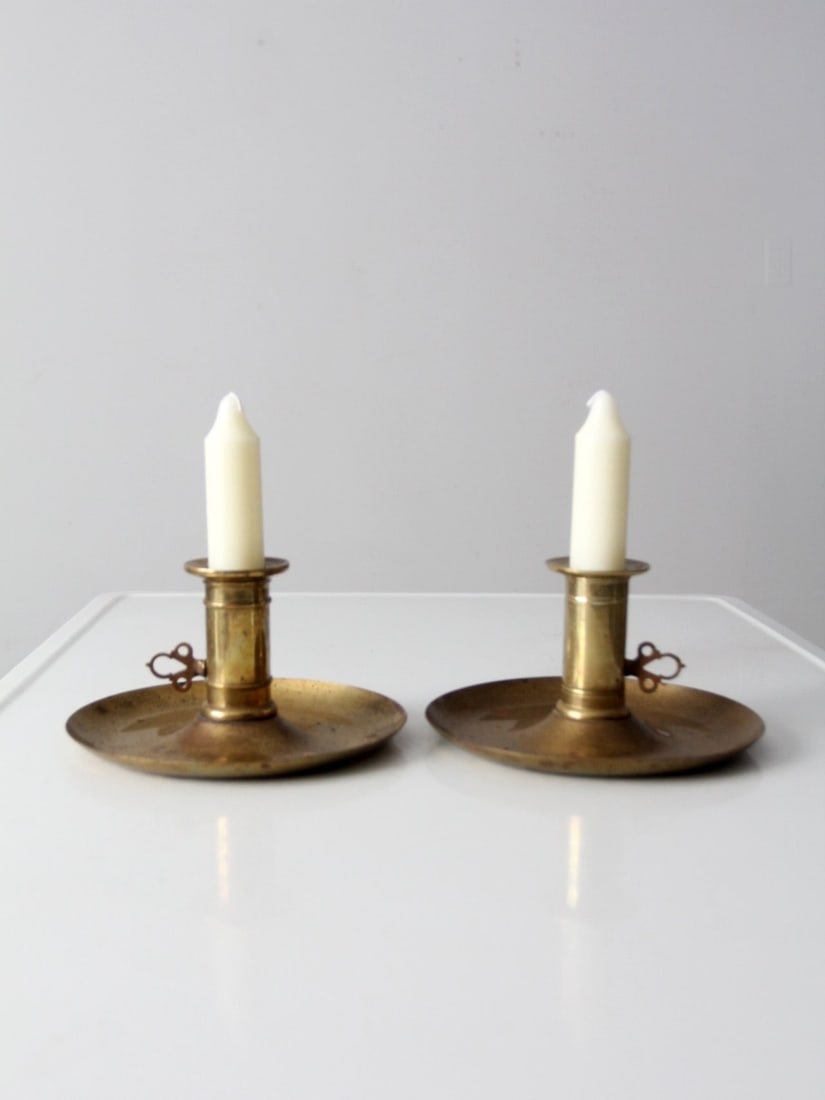 Antique Brass Push-Up Candle Holders Pair by Horndals Metallprodukter: Antique Brass Push-Up Candle Holders Pair by Horndals Metallprodukter This pair of antique brass candle holders features beautifully aged brass shapes characteristic of Swedish design. Each holder inc