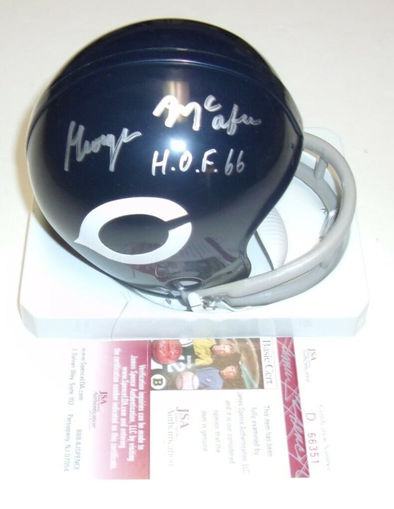 George McAfee Chicago Bears HOF 66 Signed Mini Helmet JSA COA: George McAfee Chicago Bears HOF 66 Signed Mini Helmet JSA COA This is an original mini helmet signed by George McAfee, a Hall of Fame inductee from 1966. Perfect for Chicago Bears fans and collectors